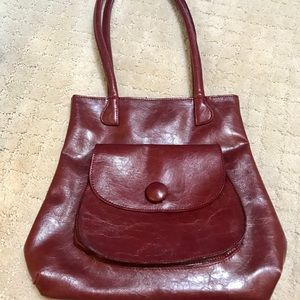 Sabina shoulder bag. Brownish red colored.
